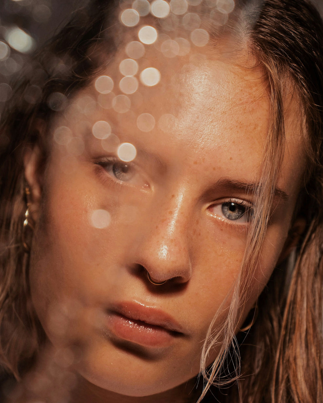 close portrait of woman with bokeh